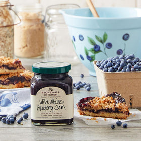 Pour shot of Wild Maine Blueberry Jam over toast for a bright breakfast