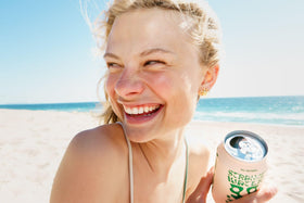 Strange Water Sparkling Coconut Water 4-pack serving idea in a chilled glass.