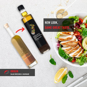 Plate with Strength Genesis Origin salad and Mediterranean-inspired dressing.