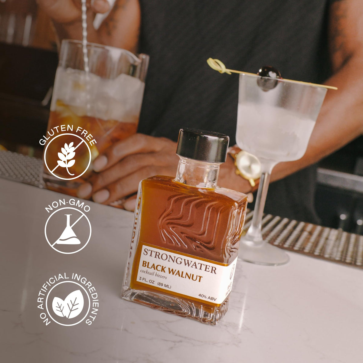 Strongwater Black Walnut Bitters bottle adds nuttiness to a Manhattan.