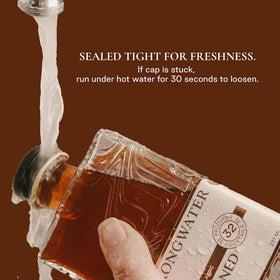 Strongwater bourbon-ready mixer beside your bottle for convenient cocktails.