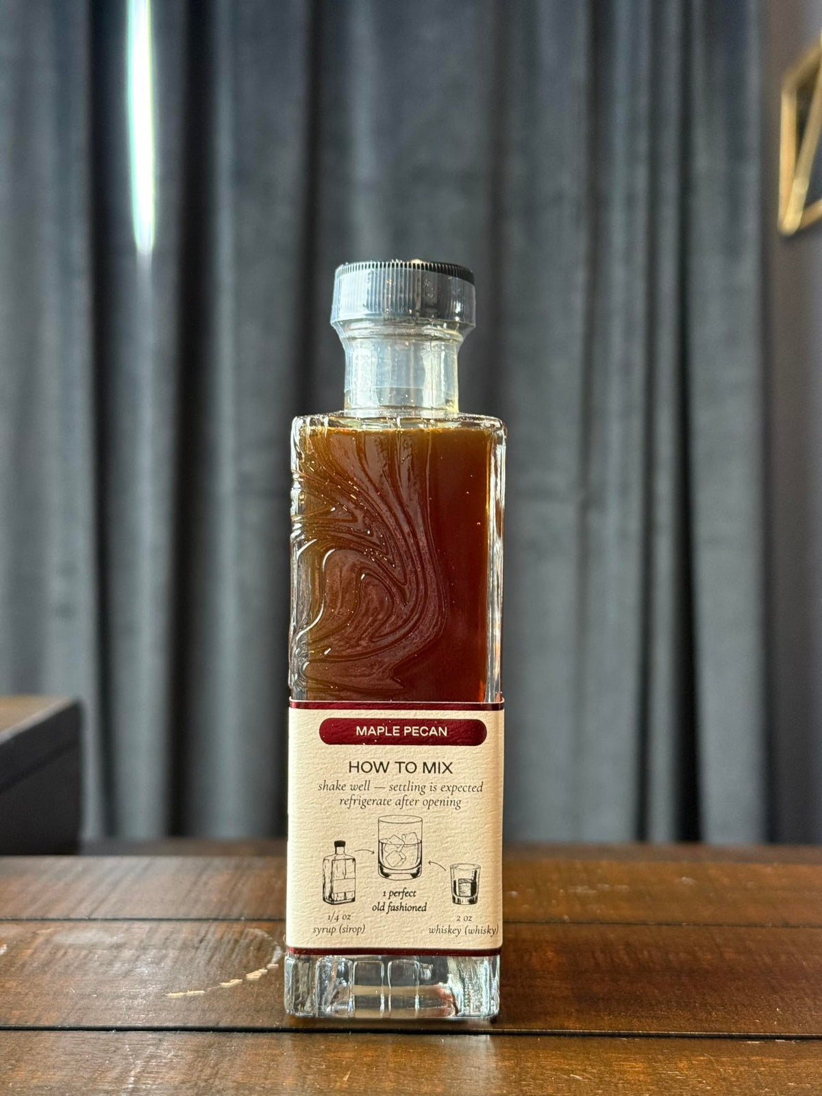 Strongwater Maple Pecan Old Fashioned mixer on a bar cart ready to serve.