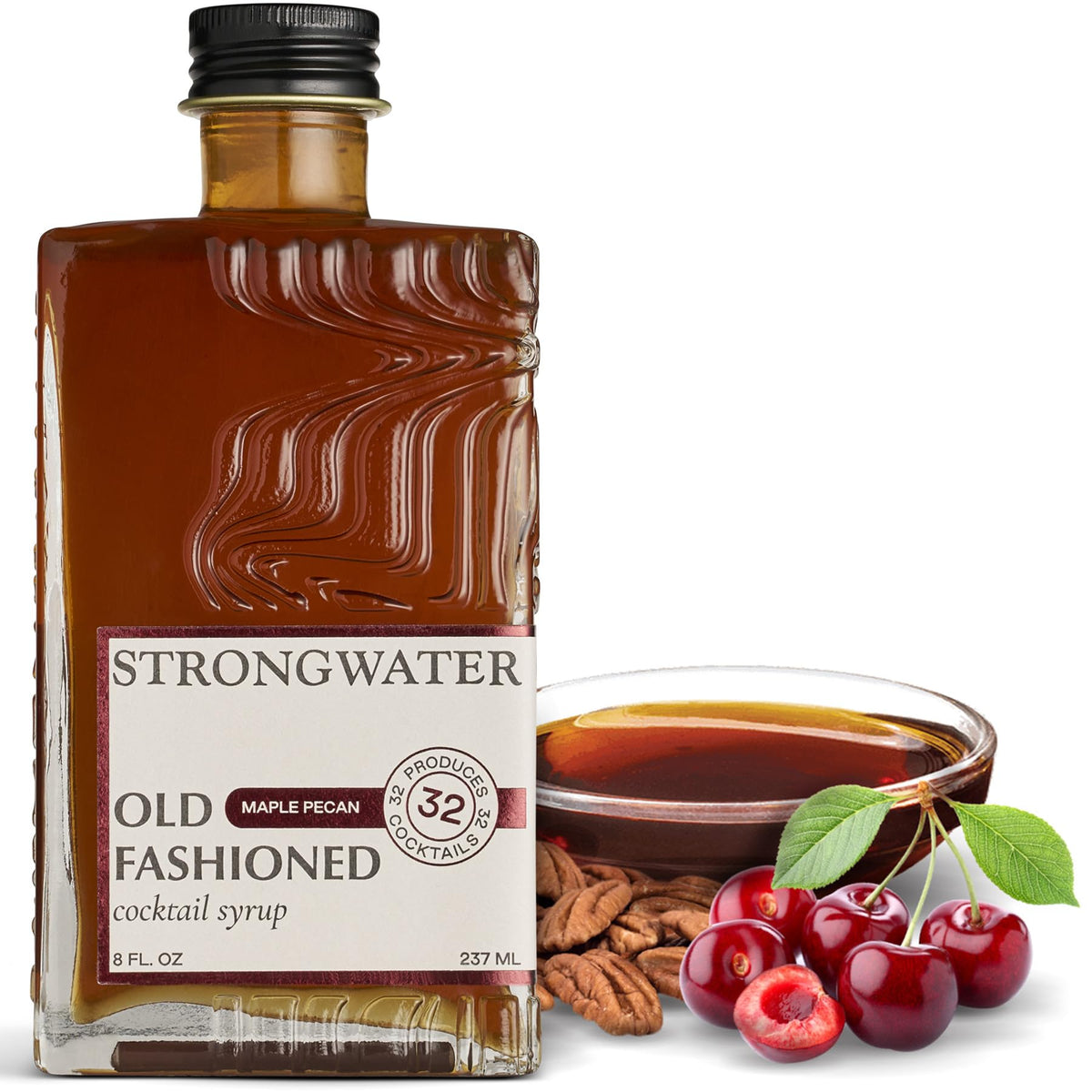 Strongwater Maple Pecan Old Fashioned mixer bottle pour highlighting balanced flavors for cocktails.