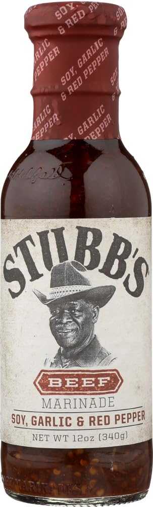 Stubb's Beef Marinade bottle closeup highlighting zesty garlic and peppers for rich flavor.