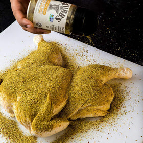 Seasoned chicken with Stubb's Rub before grilling for even coating.