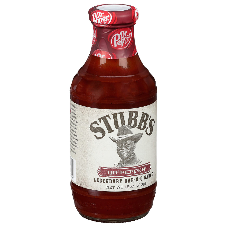 Stubb's Dr Pepper BBQ Sauce bottle pour reveals bold Texas flavor for grilling.