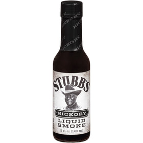 Pour of Stubbs Hickory Liquid Smoke for marinades and sauces