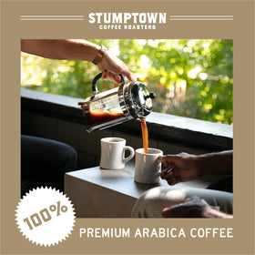 Stumptown coffee pack shot with grinder and cup, inspiring daily ritual and flavor exploration.