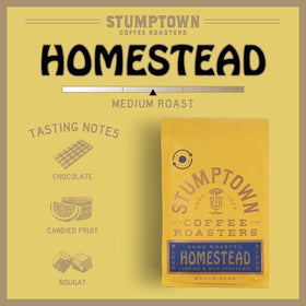 Stumptown Homestead coffee beans close-up highlighting chocolate, cherry, and orange notes.