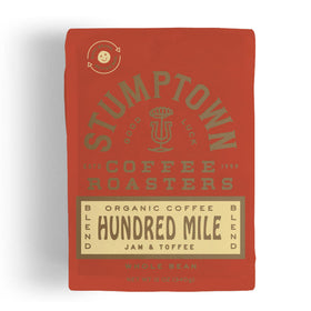 Stumptown Hundred Mile organic whole bean bag for fresh-ground brewing.