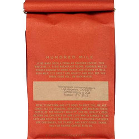 Stumptown Hundred Mile packaging on counter signals premium coffee.