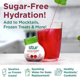 Stur LWE Black Cherry bottle with glass of water, refreshing hydration for daily moments.