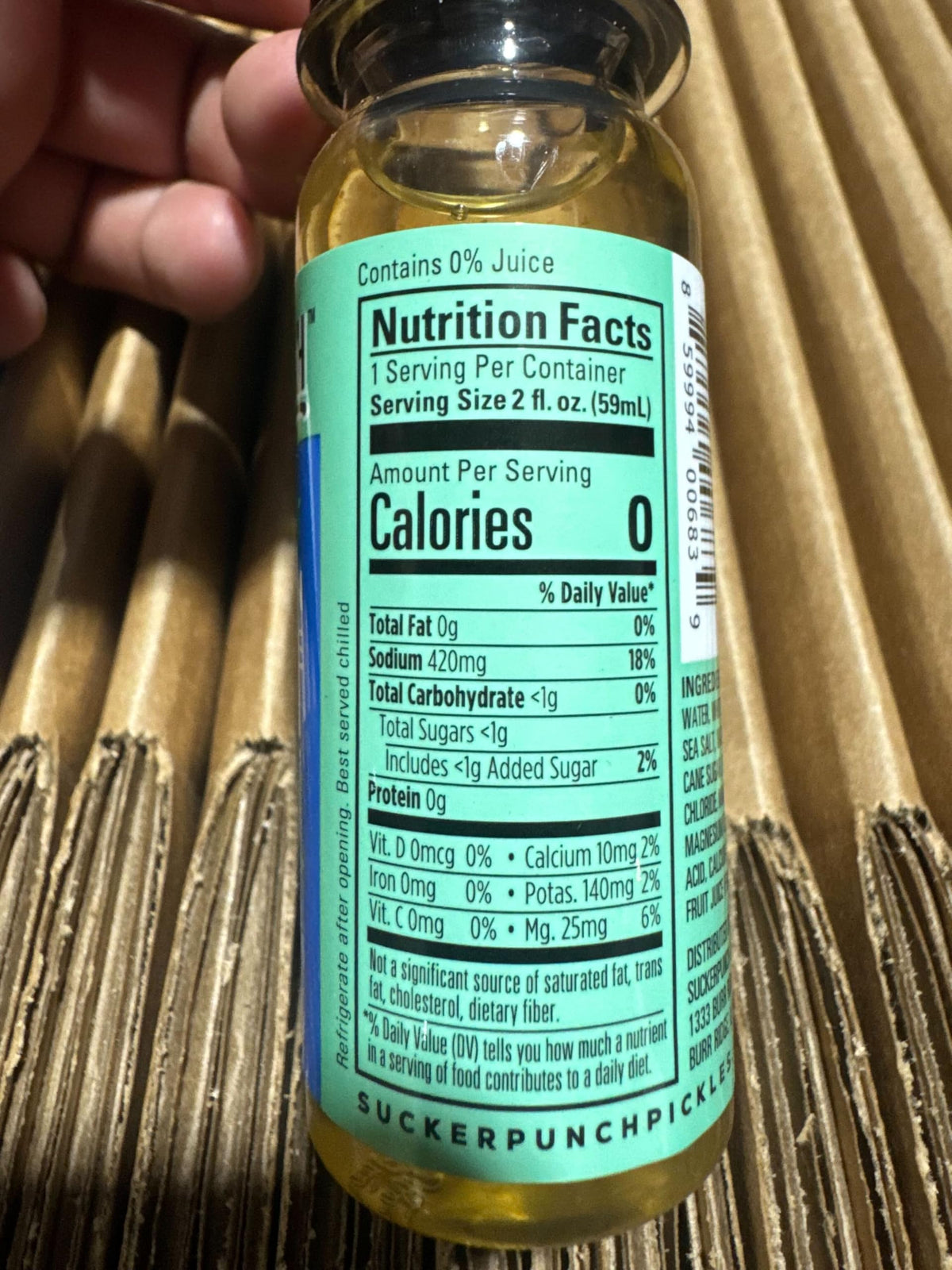 Suckerpunch pickle juice shot bottle pour supports hydration during workouts.