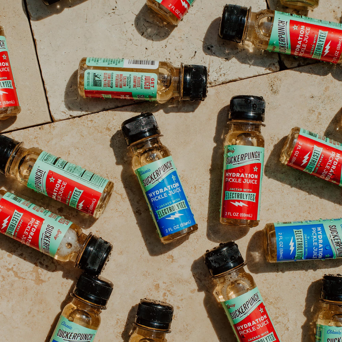 SUCKERPUNCH hydration formula bottle highlighting electrolytes and simple, non-GMO ingredients.