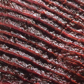 Close-up of cracked pepper texture in 1836 Beef Rub