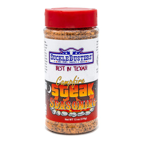SuckleBusters Campfire Steak Seasoning shaker ready for grill use, enhances flavor
