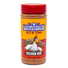SuckleBusters Clucker Dust bottle on grill showing bold color enhancement for chicken