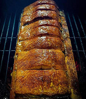 SuckleBusters Honey BBQ Rub grilled chicken showcasing versatile poultry seasoning.