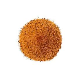 Applying the rub yields a thick, even crust before grilling.