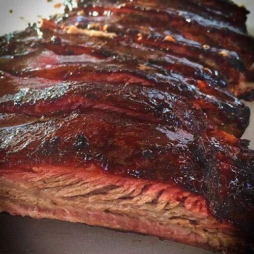 Close-up of rub with pecan oil aroma for high-heat grilling compatibility.