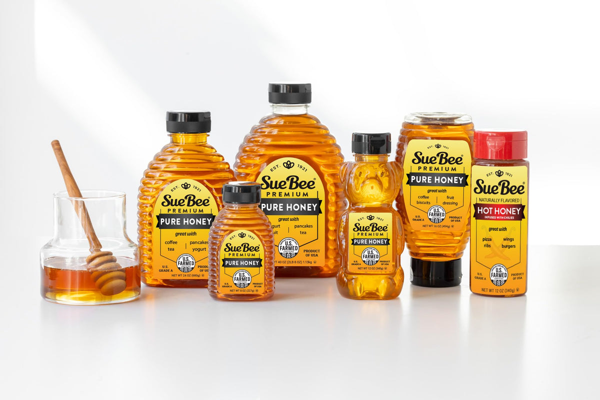 Sue Bee Pure Premium Honey being poured over yogurt shows versatile natural sweetener.