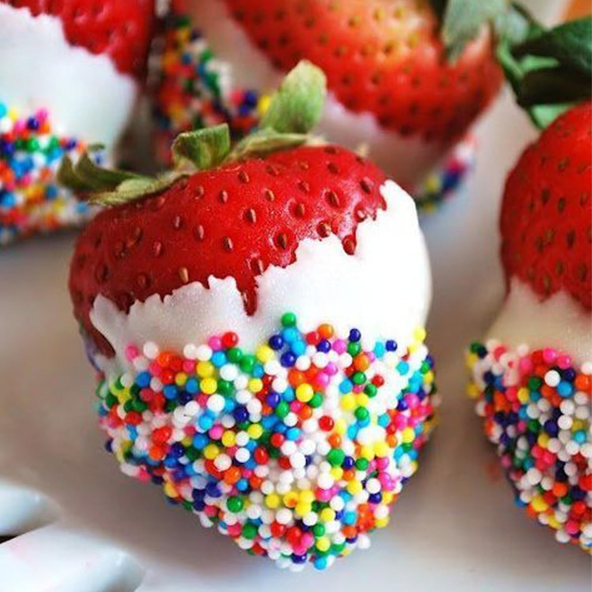 Sujoygar Rainbow Sprinkles sprinkled on cookies for cheerful desserts