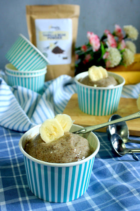 Summer Day Naturals Vanilla Bean Powder sprinkled on ice cream for natural vanilla depth