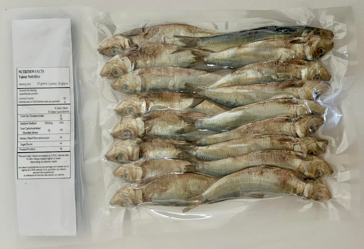 Sun Dried Seafoods dried herring on plate invites savory snacks and quick meals.