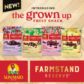 Sun-Maid Farmstand Reserve on a holiday charcuterie board with berries.