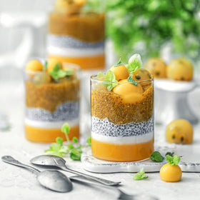 Suncore Foods Organic White Chia Seeds measured with a spoon for portion control.