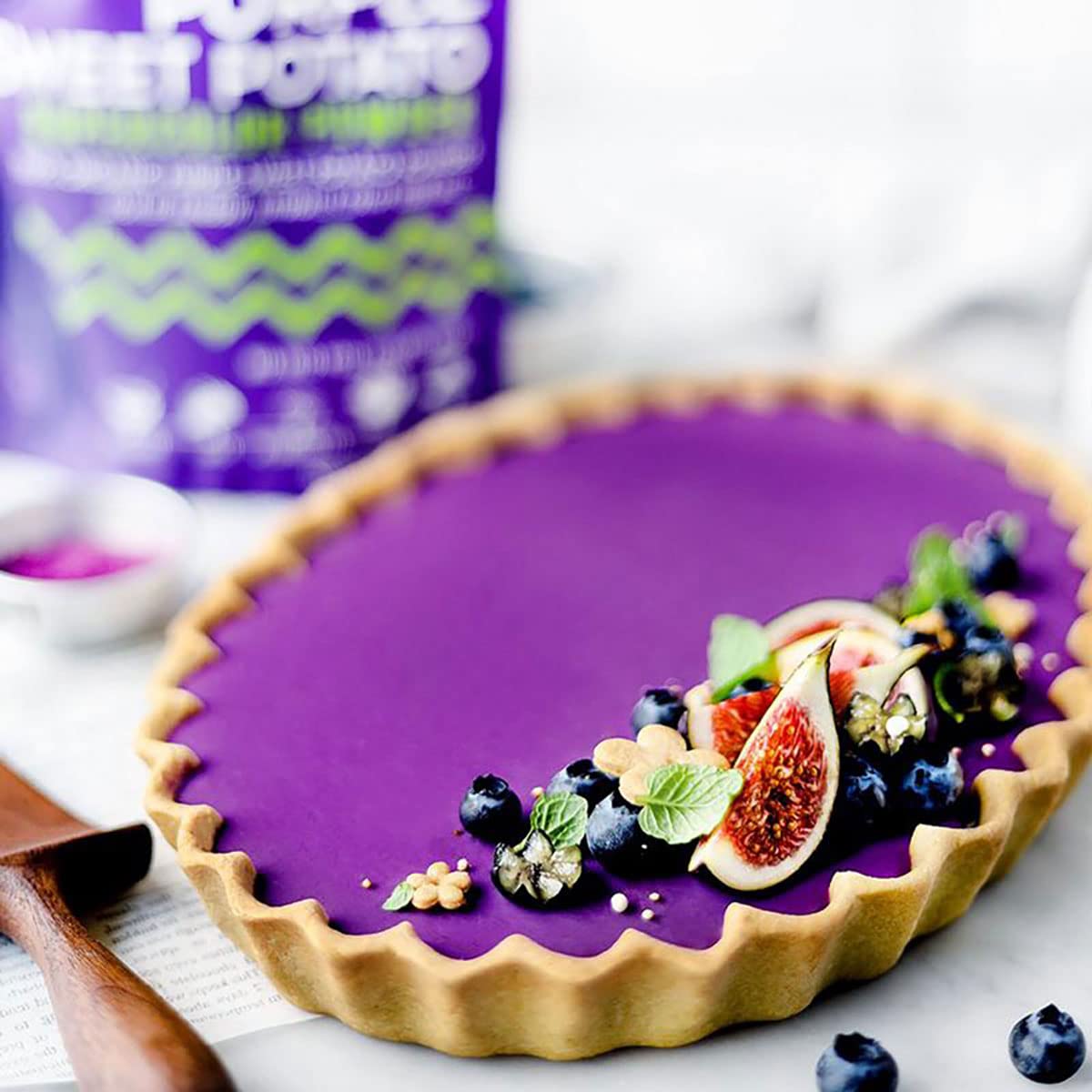 Suncore Foods Purple Sweet Potato Powder mixed into pasta dough for colorful, gluten-free meals.