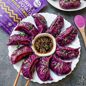 Suncore Foods Purple Sweet Potato Powder stored in a resealable pouch preserves freshness.