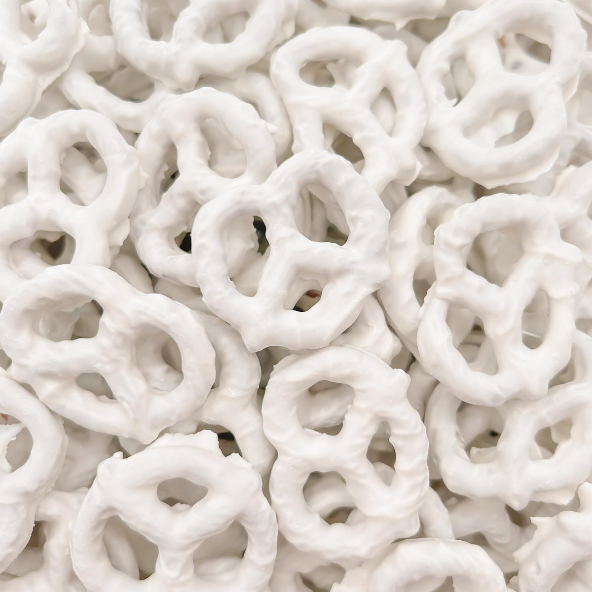 Close-up of vanilla yogurt coating on Sunny Island pretzels highlighting creaminess