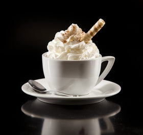 Sunny Sky Upouria Mocha syrup pour over latte with crema.