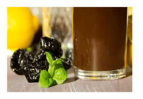 Sunsweet Prune Juice pack on kitchen counter, gluten-free option for vegetarians.