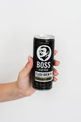 Suntory BOSS Coffee can on desk with ready-to-drink appeal.