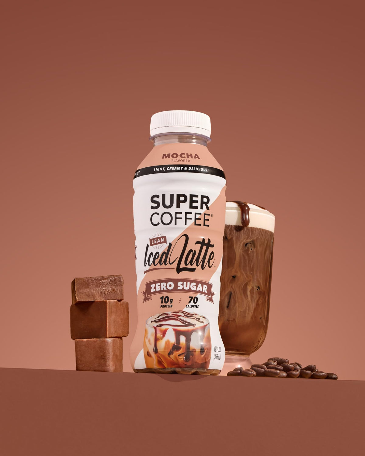 SUPER COFFEE mocha bottle with ice and glass for refreshing caffeine boost