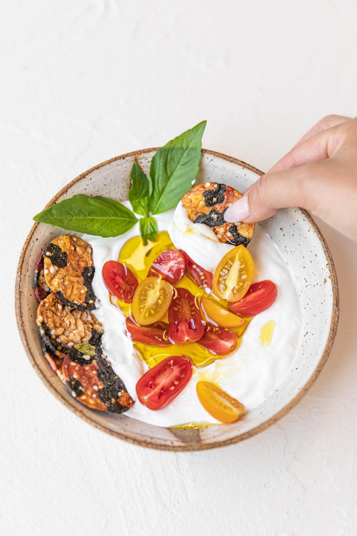 Serving idea shows Super Natural Snack crisps on a plate; great for sharing.