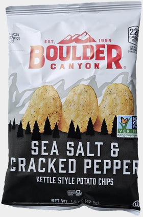 SUPERDEALS Boulder Canyon chips close-up highlighting pepper kick and sea salt flavor.