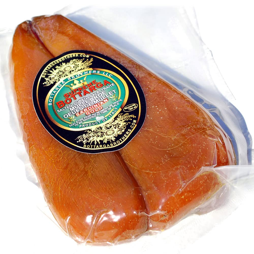 Supreme Bottarga Sardinian Gold jar on a rustic board enhancing seafood flavor