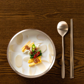 Surasang Tteokguk beef-flavored broth swirl