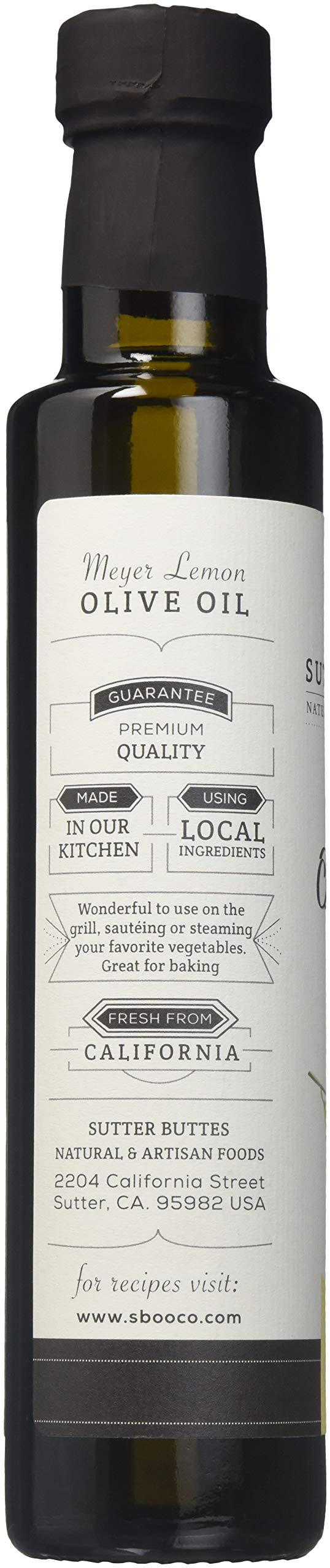 Sutter Buttes Meyer Lemon EVOO bottle pour capturing fresh aroma for grilling and baking.