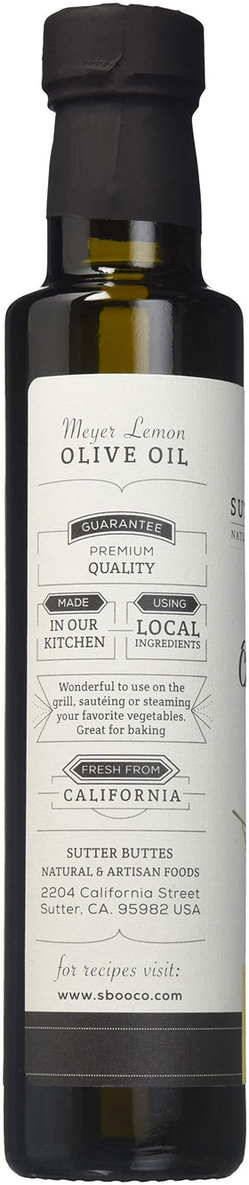 Sutter Buttes Meyer Lemon EVOO bottle pour capturing fresh aroma for grilling and baking.