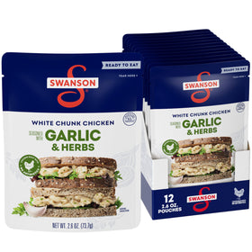 Swanson S garlic and herbs chicken pouch in hand ready-to-eat on the go.