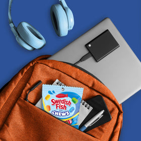 Swedish Fish chews movie theater candy vibe, a fruity treat for film nights.