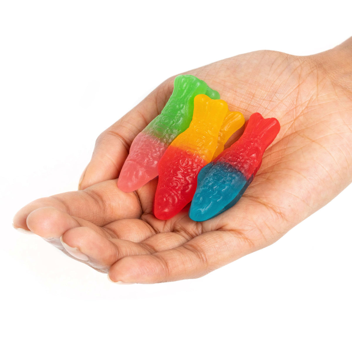 Swedish Fish Tails movie theater candy for convenient cinema snacking.