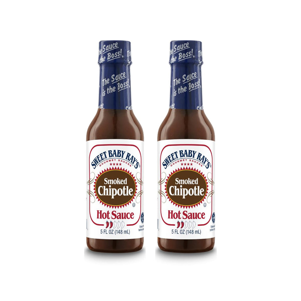 Sweet Baby Ray’s Smoked Chipotle Hot Sauce bottle pour adds rich smoky heat to meals.
