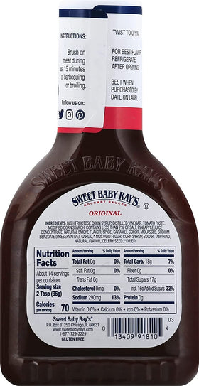Sweet Baby Ray's glaze-ready sauce beside a grilled burger and napkin.