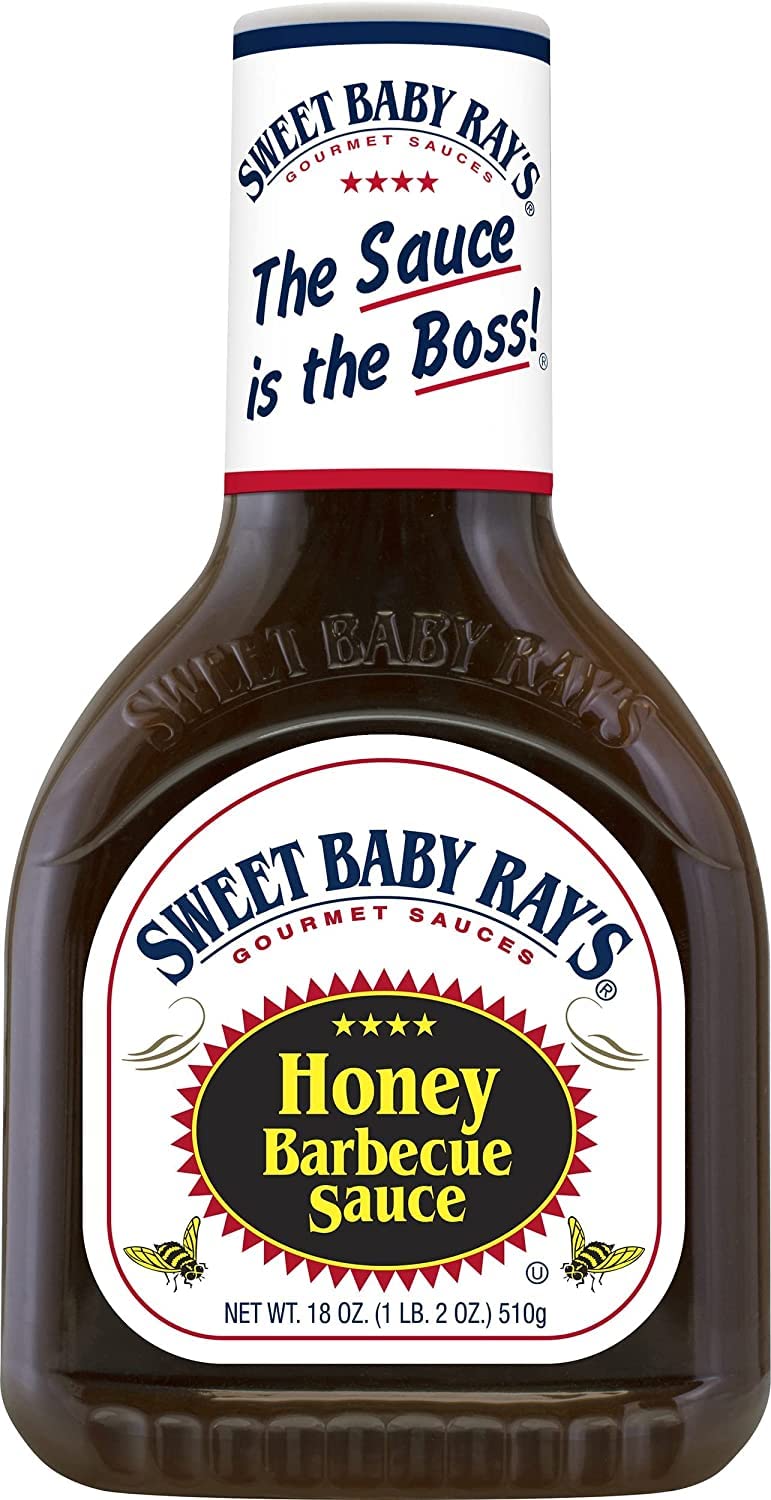 Sweet Baby Ray's Hickory Brown Sugar BBQ bottle ready for grilling.