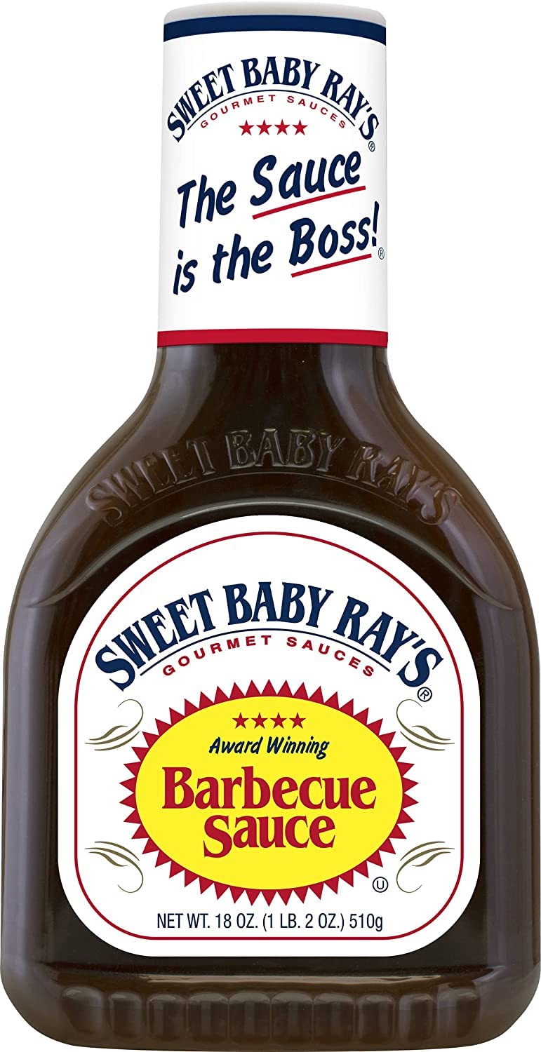 Sweet Baby Ray's Original BBQ sauce bottle pouring over a juicy burger.